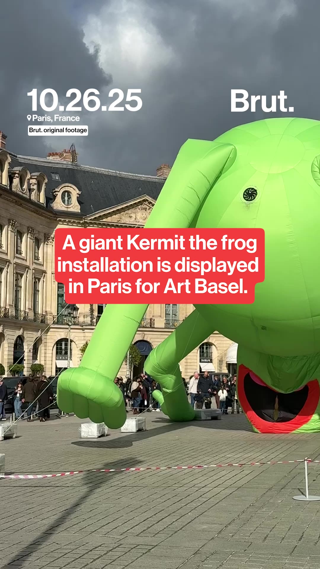 A giant Kermit the frog installation is displayed in Paris for Art Basel. 