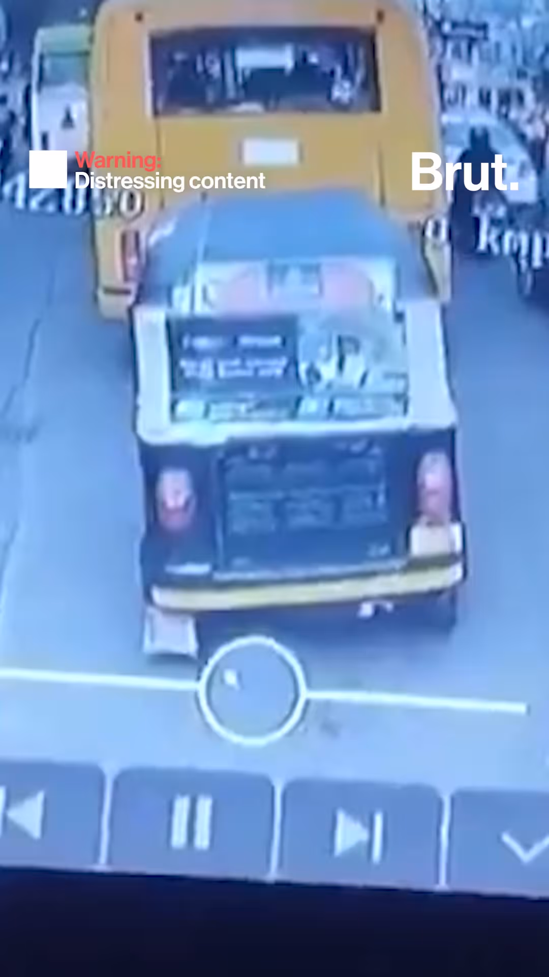 Auto crushed between buses