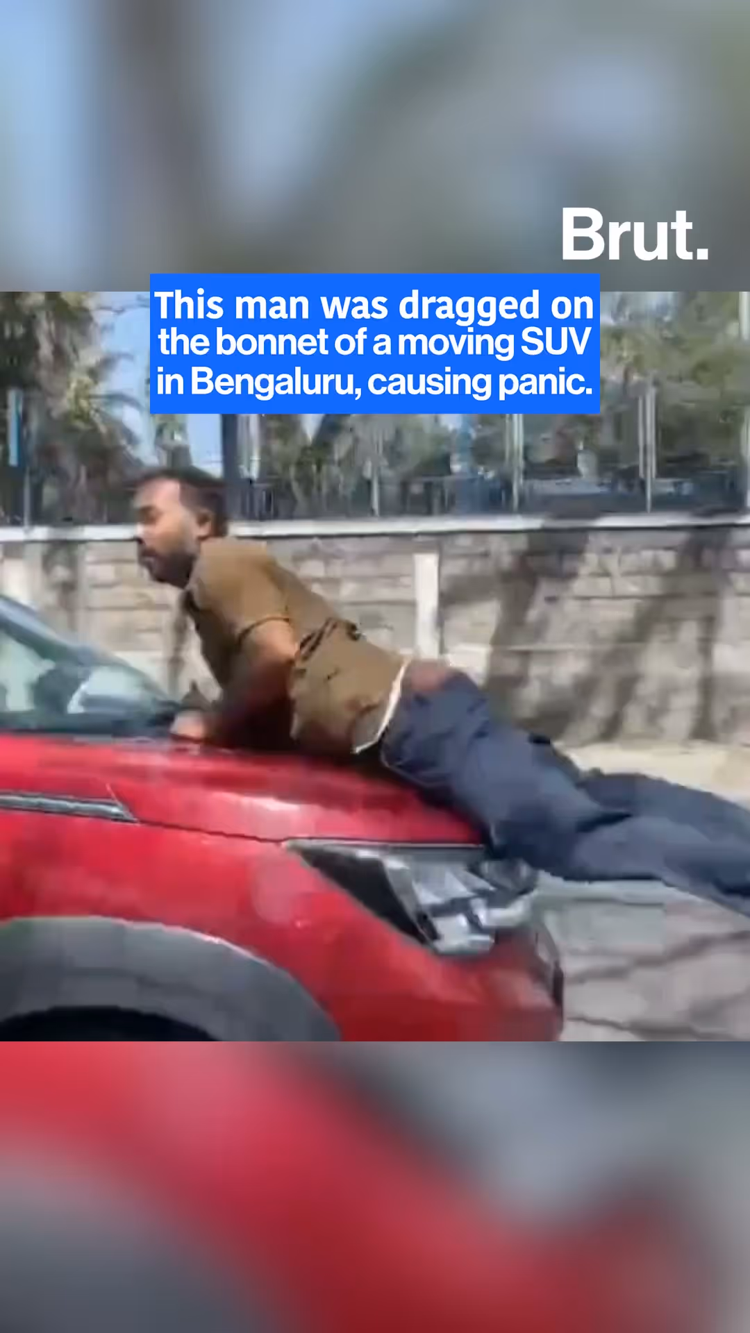 man-clings-to-bonnet