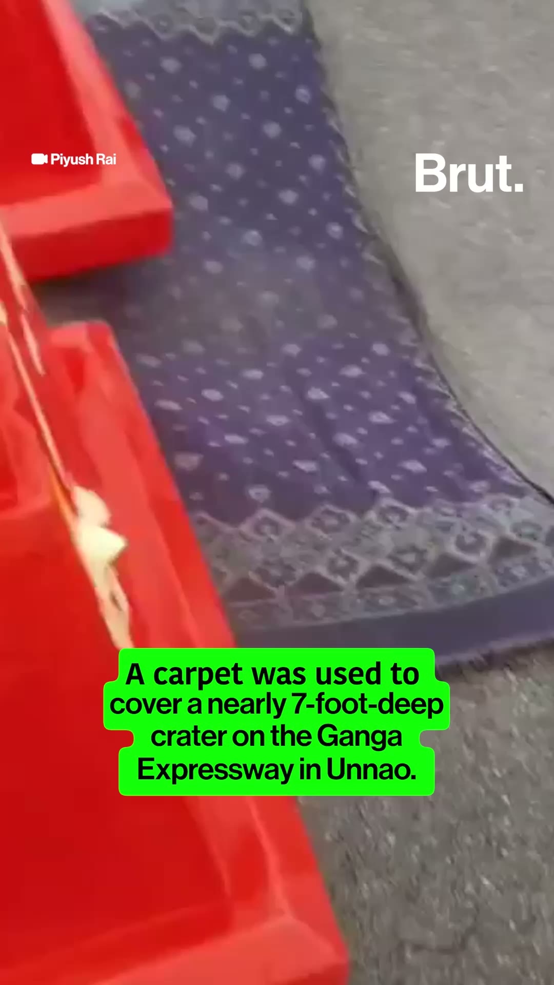 a-carpet-was-used-to-cover-a-patchy-section-of-the-road-near-ganga-expressway