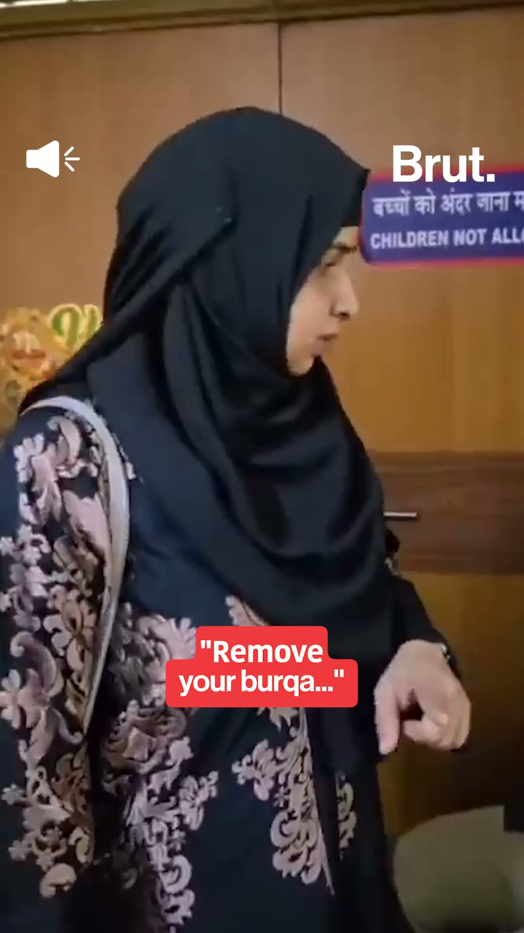 Burqa clad woman in a confrontation