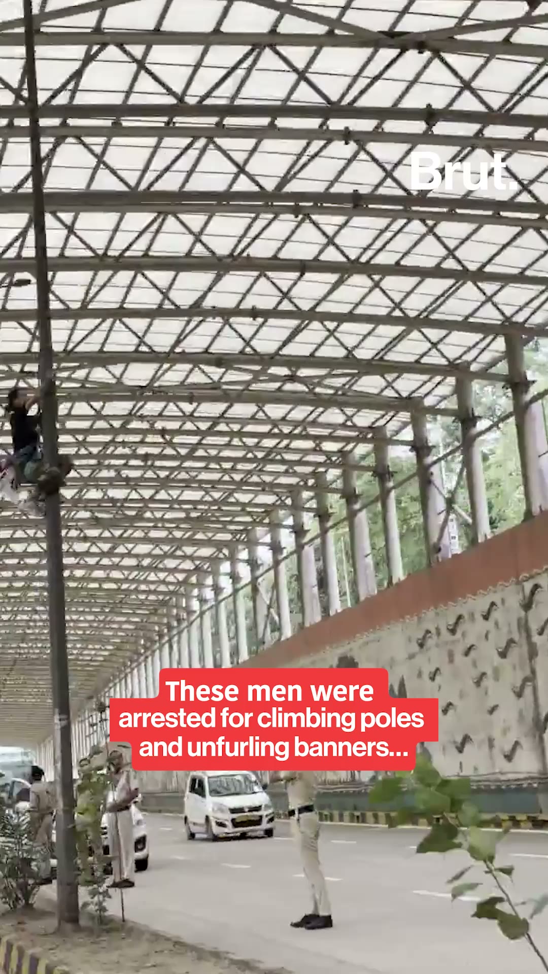 Tibetan activists detained for climbing poles and unfurling banners in Delhi: