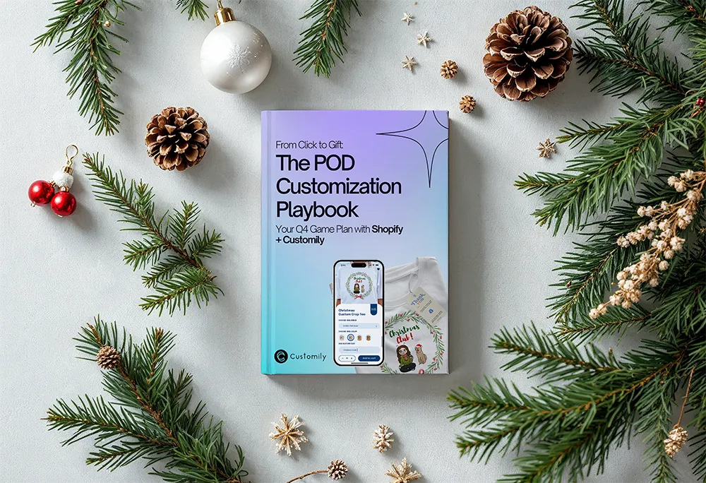 A printed copy of Customily's the POD Customization Playbook displayed on a Christmas setting.