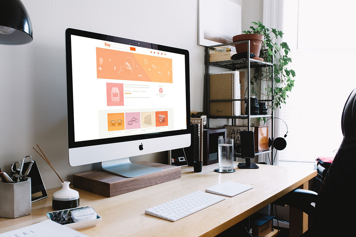 Desktop with a computer on an etsy page