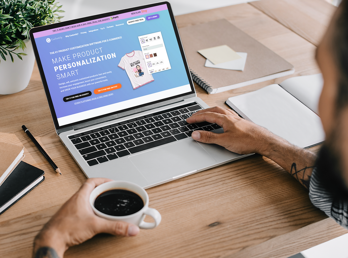 Man with a notebook searching Customily's website