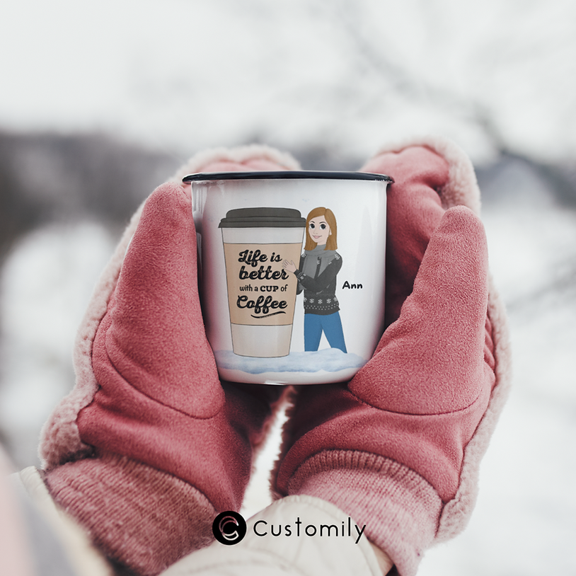Hands holding a personalized mug with clipart