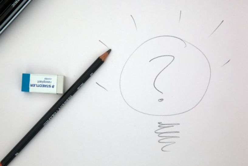 Pencil and question mark