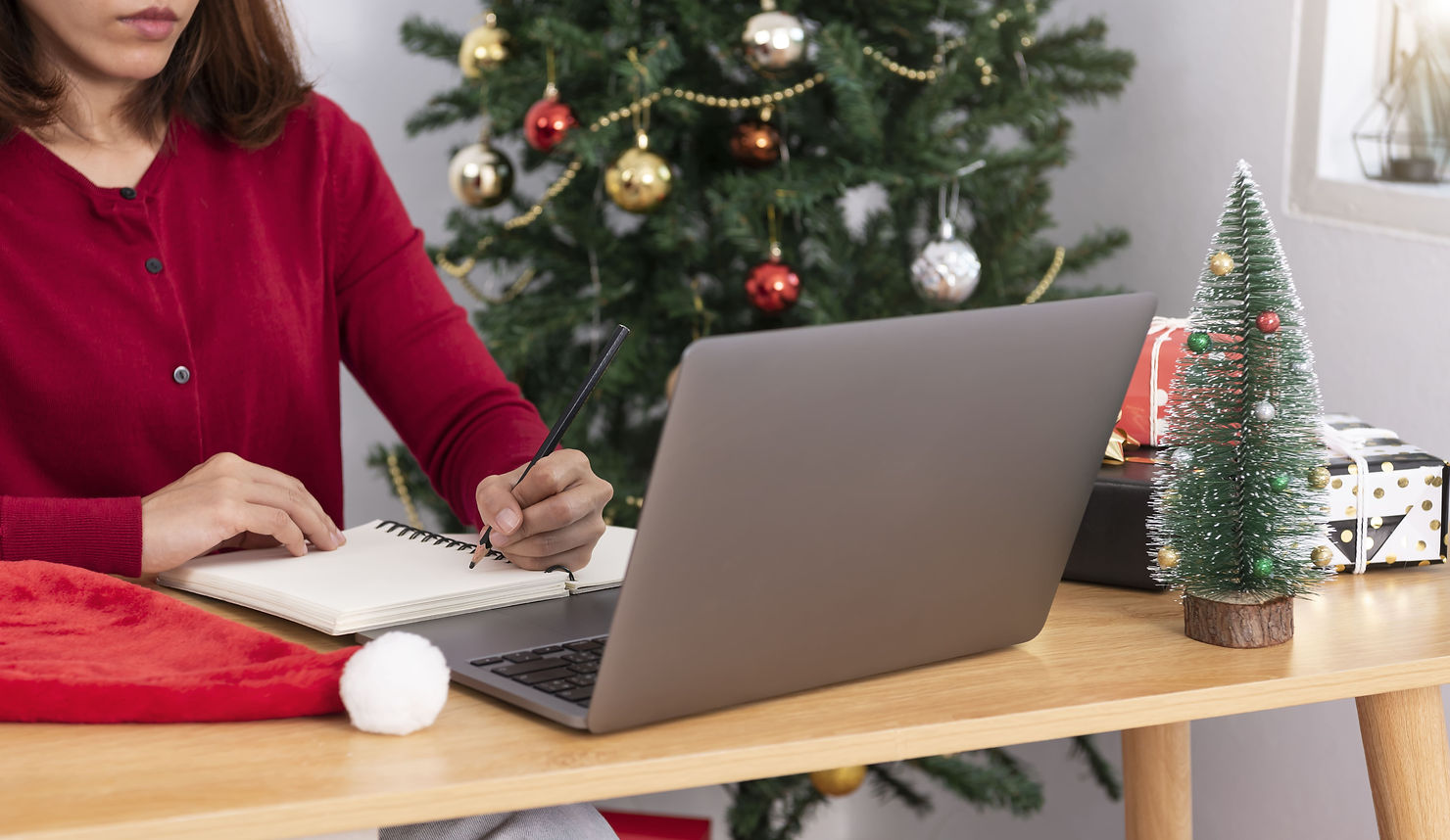 Girl writing in christmas season