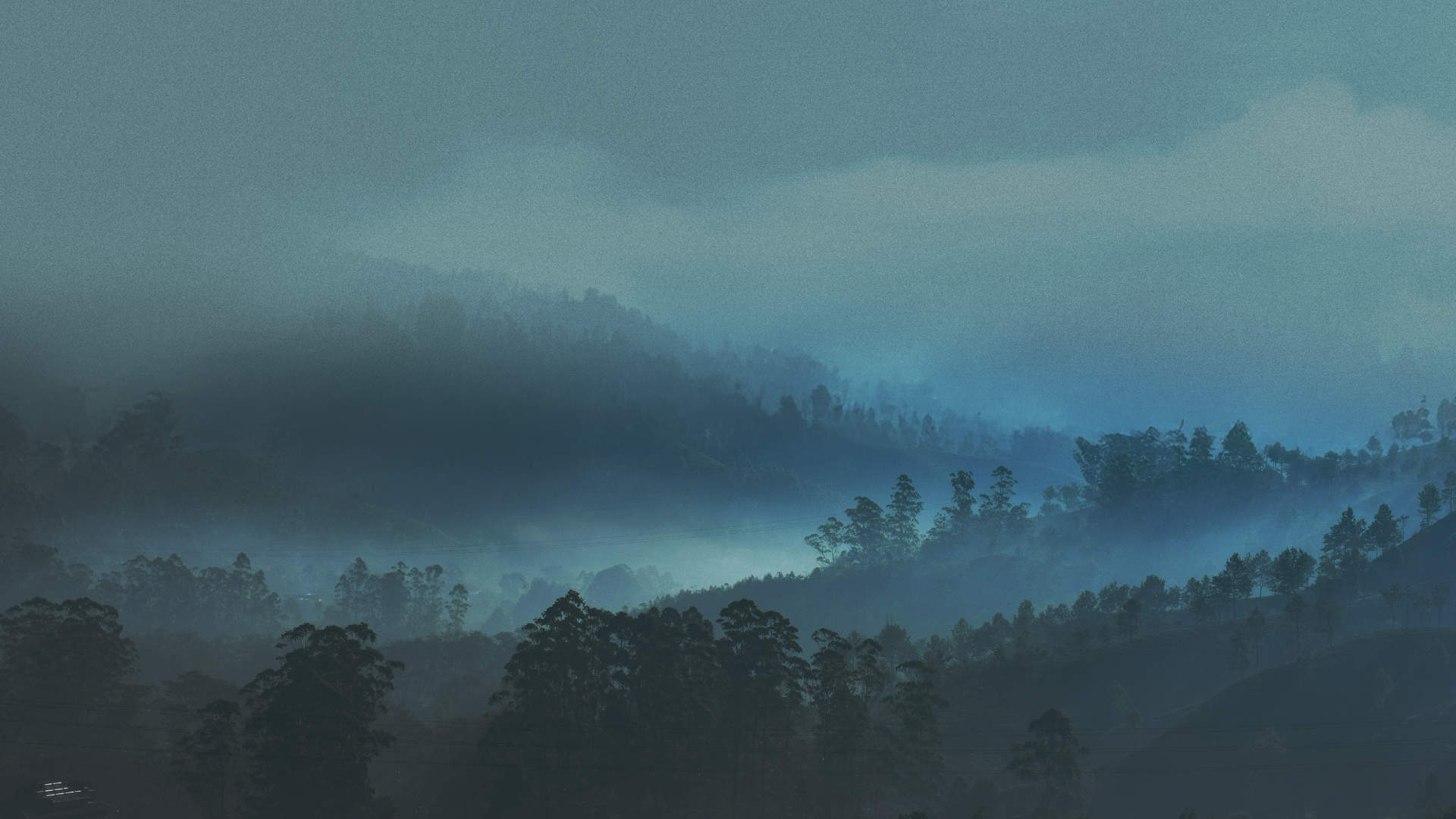 Radius logo ooverlayed on foggy mountain landscape