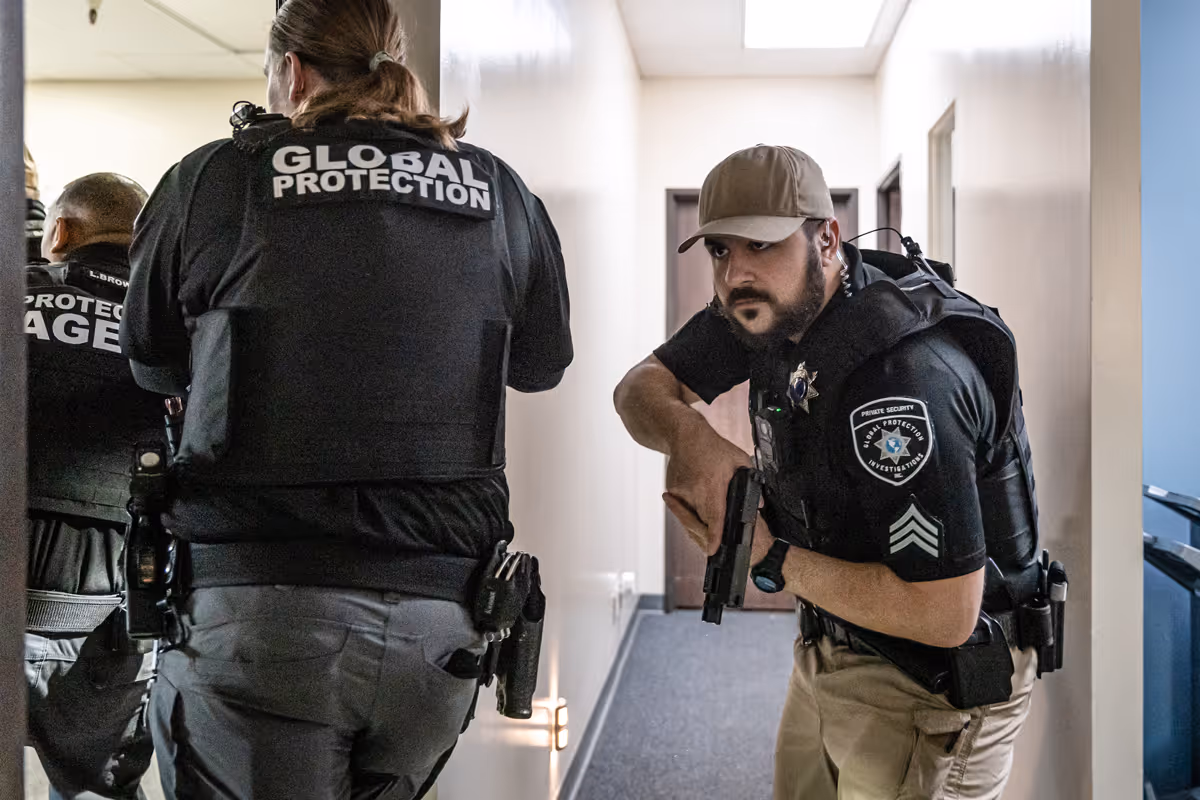 Armed agents entering a compromised location.