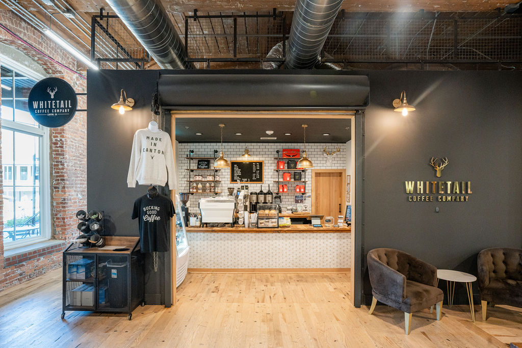 Whitetail Coffee at The Mill in Canton, GA, a warm, industrial-inspired café where raw textures meet refined design.