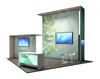 Modern trade show booth for The Trade Group with screens and seating area.