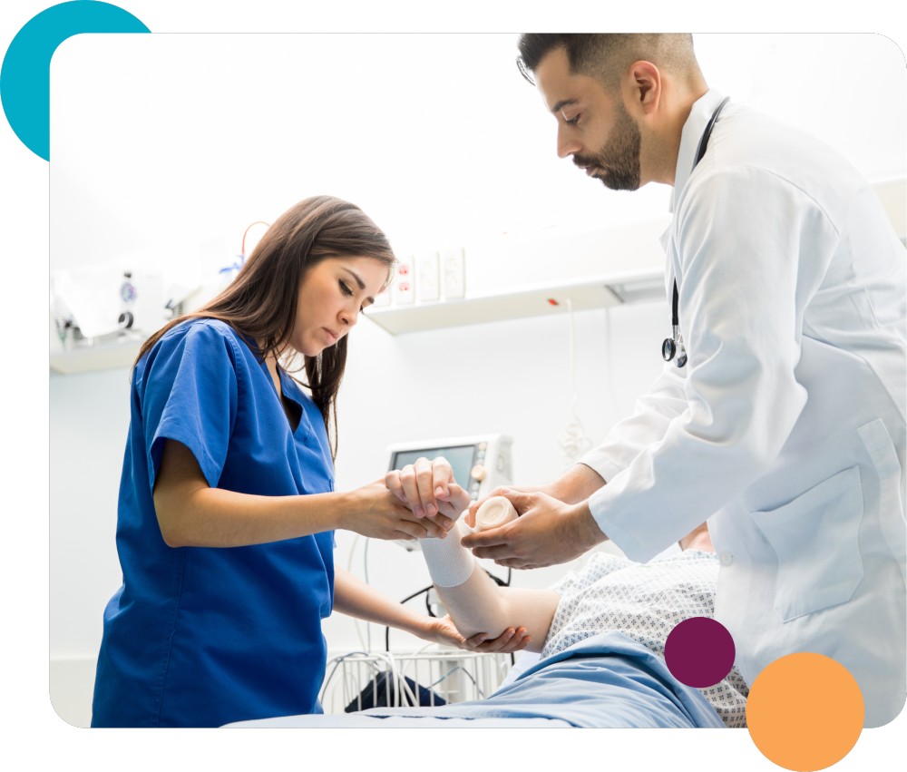 An ER Nurse assists with patient care