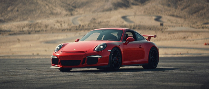 red Porsche on a desert road, Dialed Watches commercial