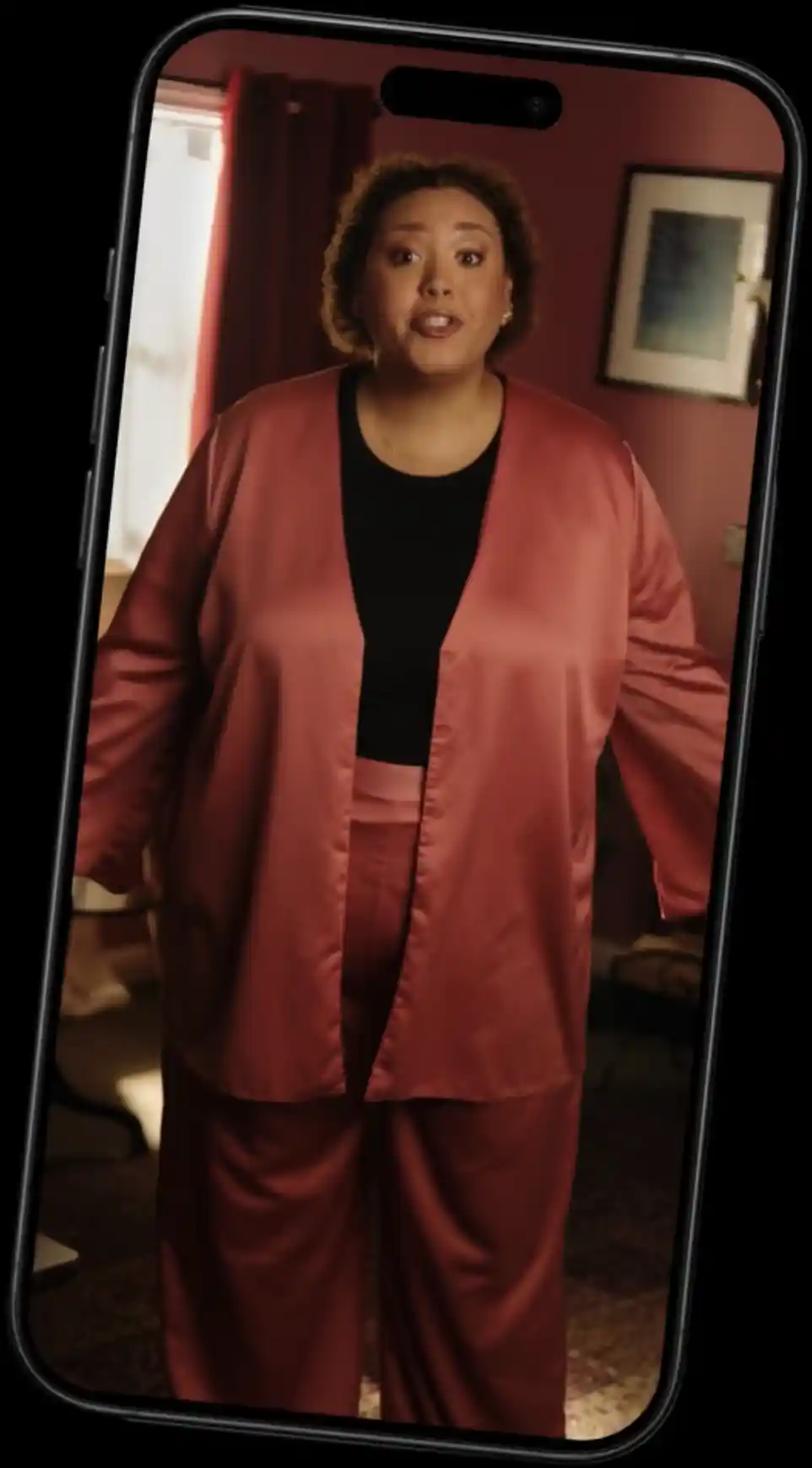 ugc-style phone video of a woman in red pajamas