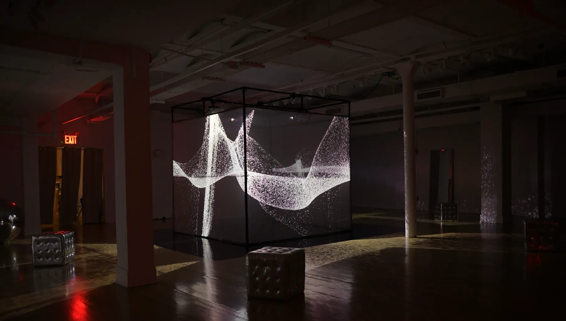 a wave of white light inside the projection cube