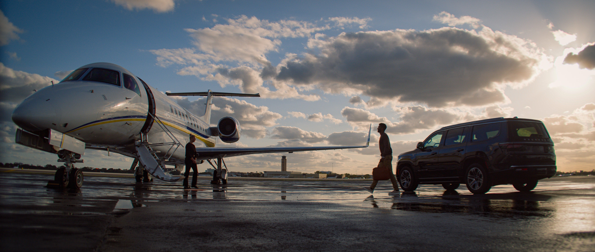 man walking to private jet