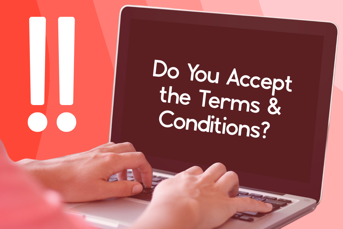 Hands typing on computer which reads do you accept the terms and conditions? Exclaimation marks add alarm to the image