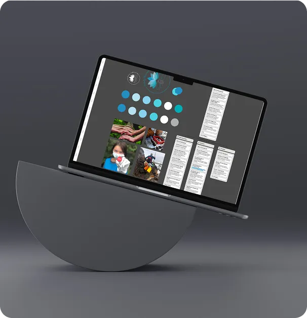 Portátil abierto mostrando un diseño de página con imágenes, iconos circulares y bloques de texto.
