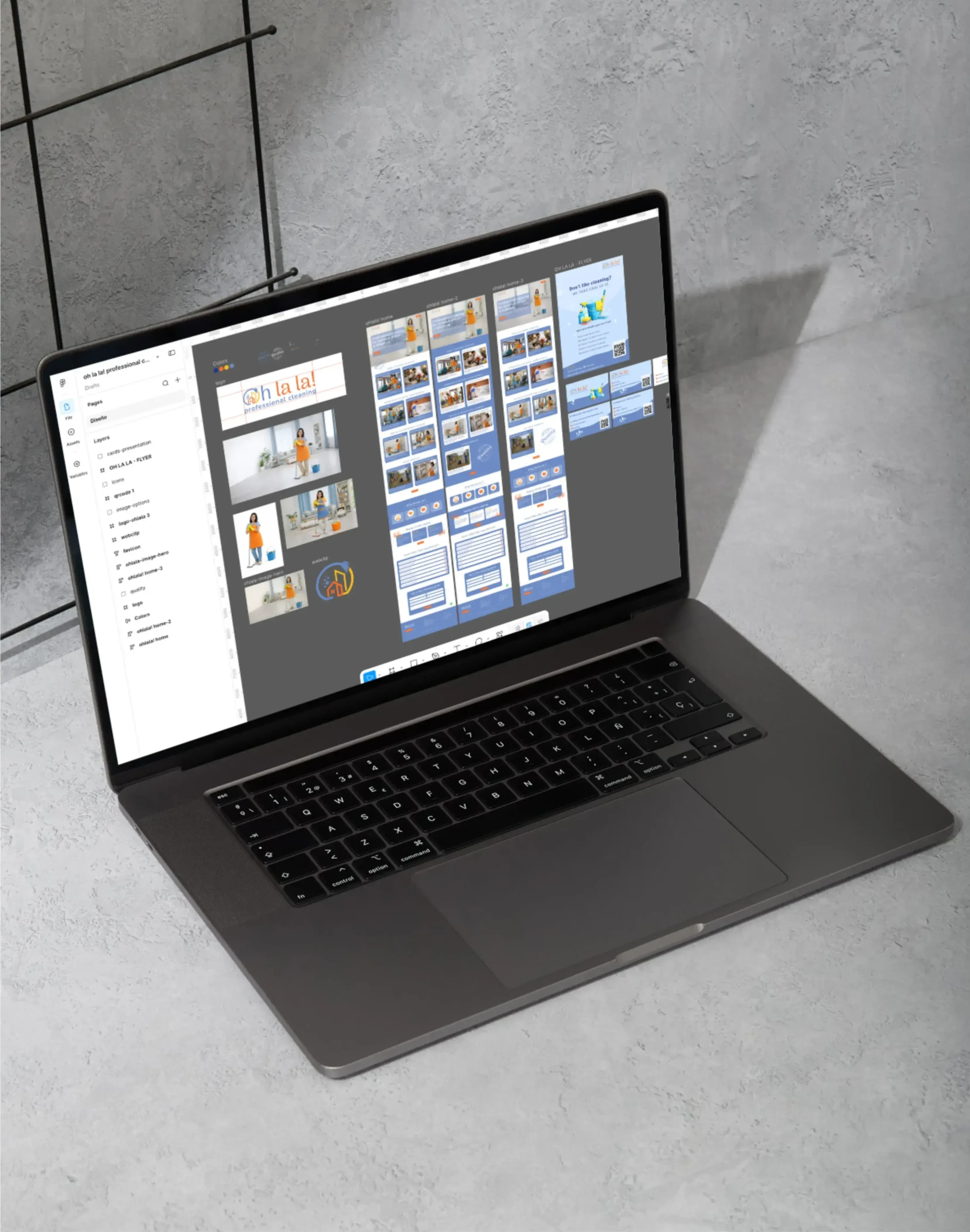 Laptop on gray desk showing a cleaning service flyer design project on screen.