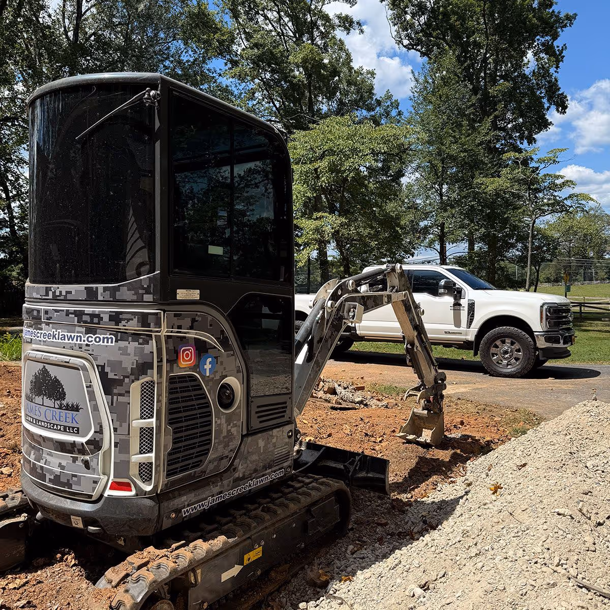 Skid steer grading and landscaping by James Creek Lawn and Landscape near me