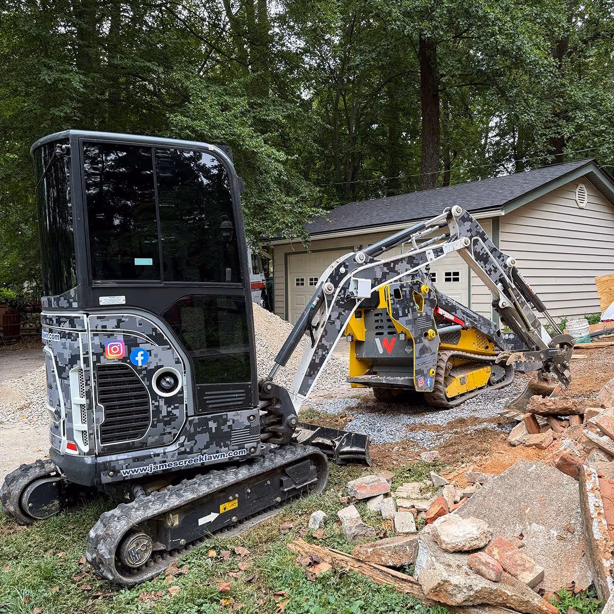 James Creek Lawn and Landscape skid steer working on site preparation