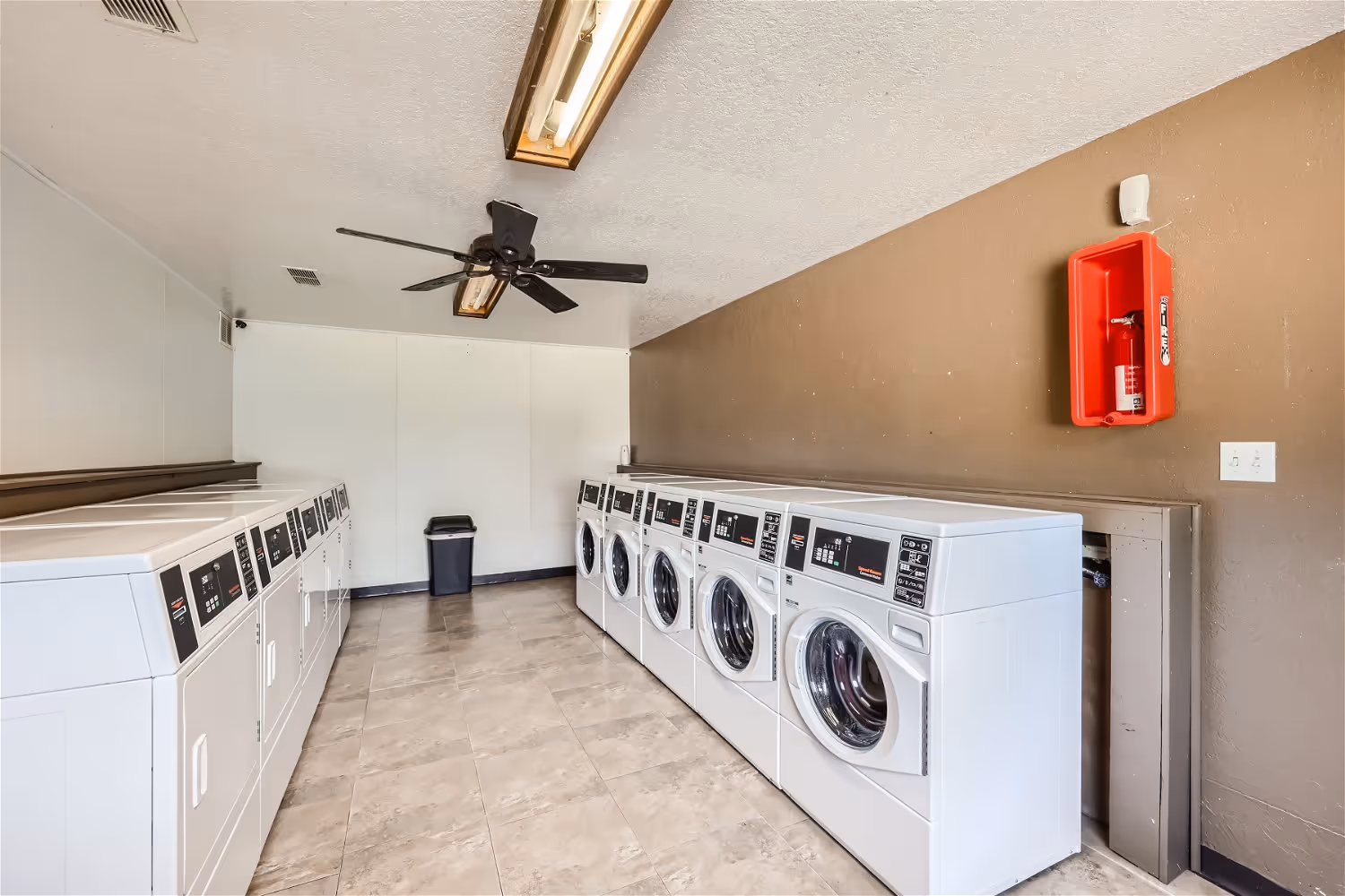 Laundry room with phone