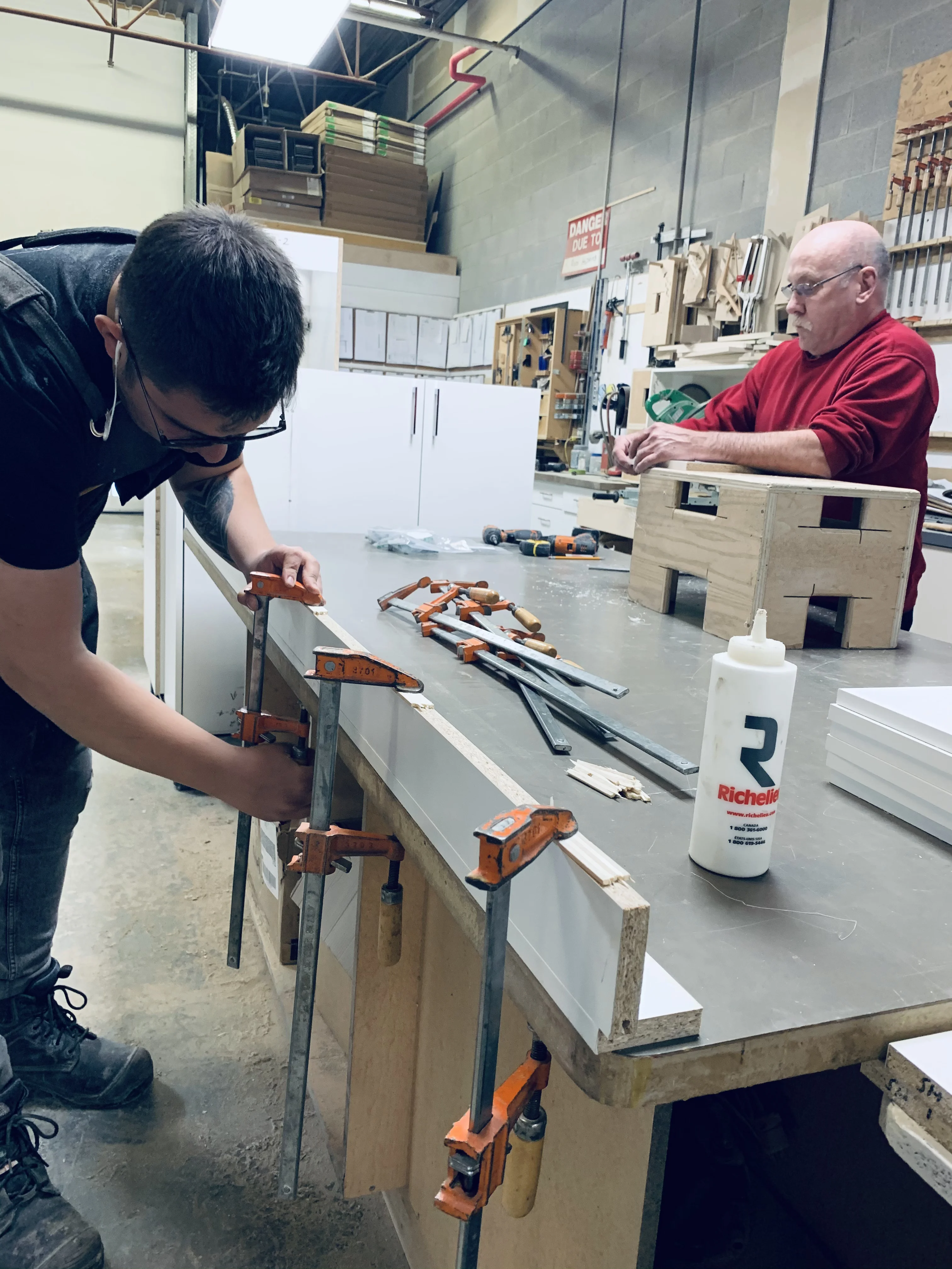 cabinet shop workers creating