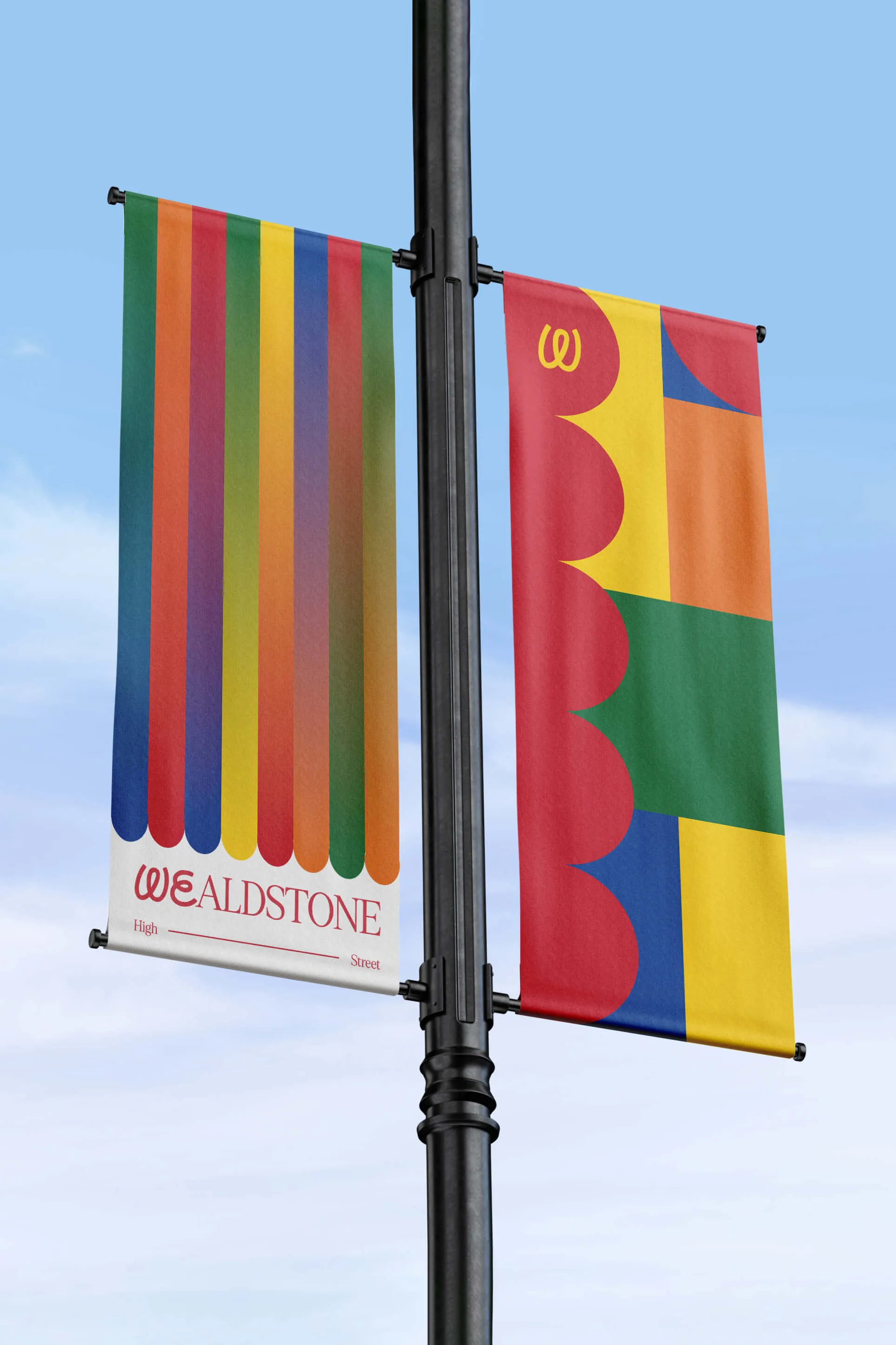 Lamp post banners installed in Wealdstone, featuring the place identity colour palette derived from local communities.
