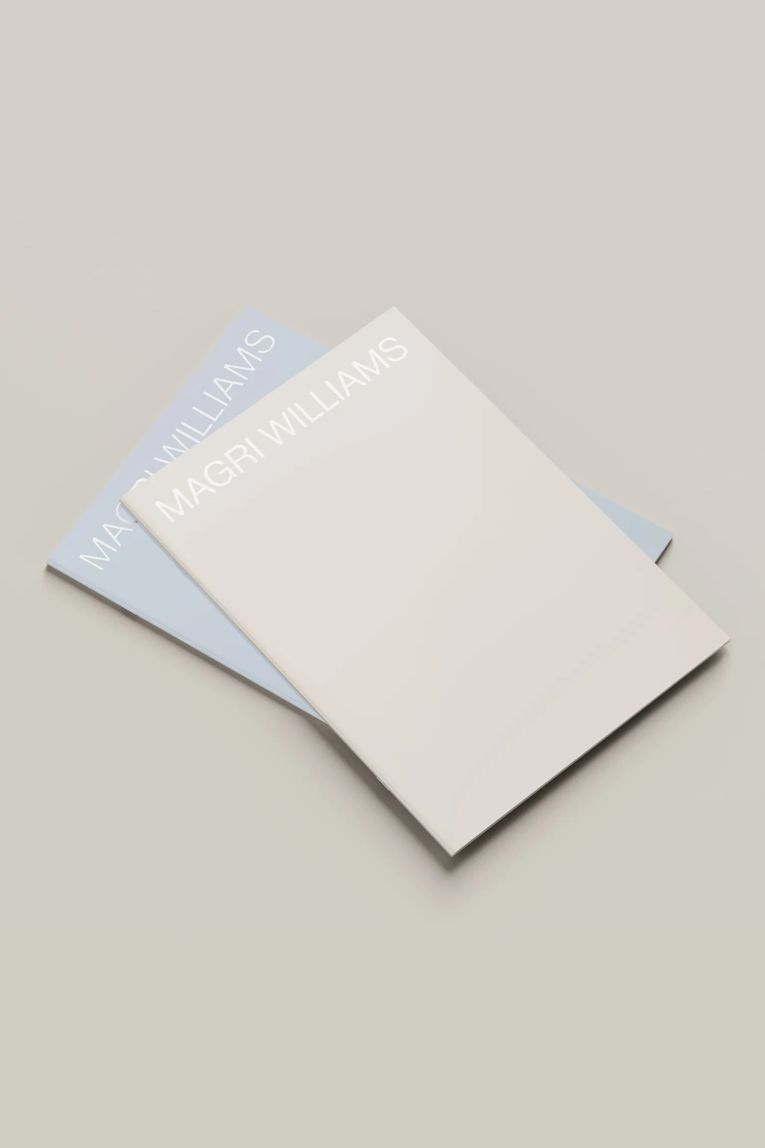 Portrait covers of presentation documents designed for Magri Williams, showcasing the earthy colour palette.