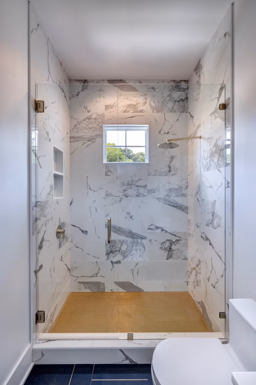 Home office bathroom with open shower