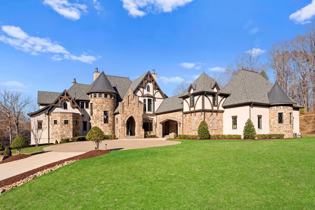 Chateau-style custom home with lakefront property built by Augusta Homes on Lake Norman