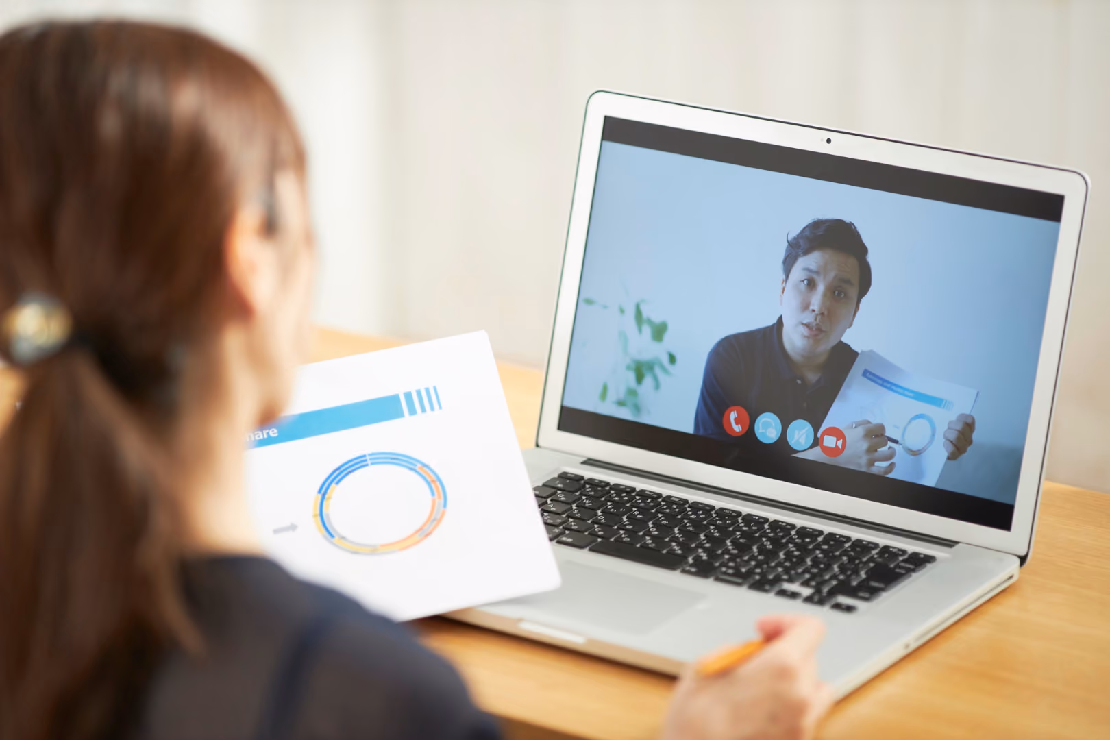 Woman attending grief counselling on video call