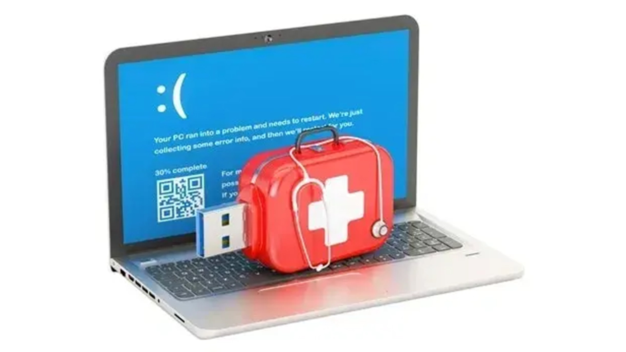 Laptop with an error screen and a first-aid kit, illustrating a computer that needs help