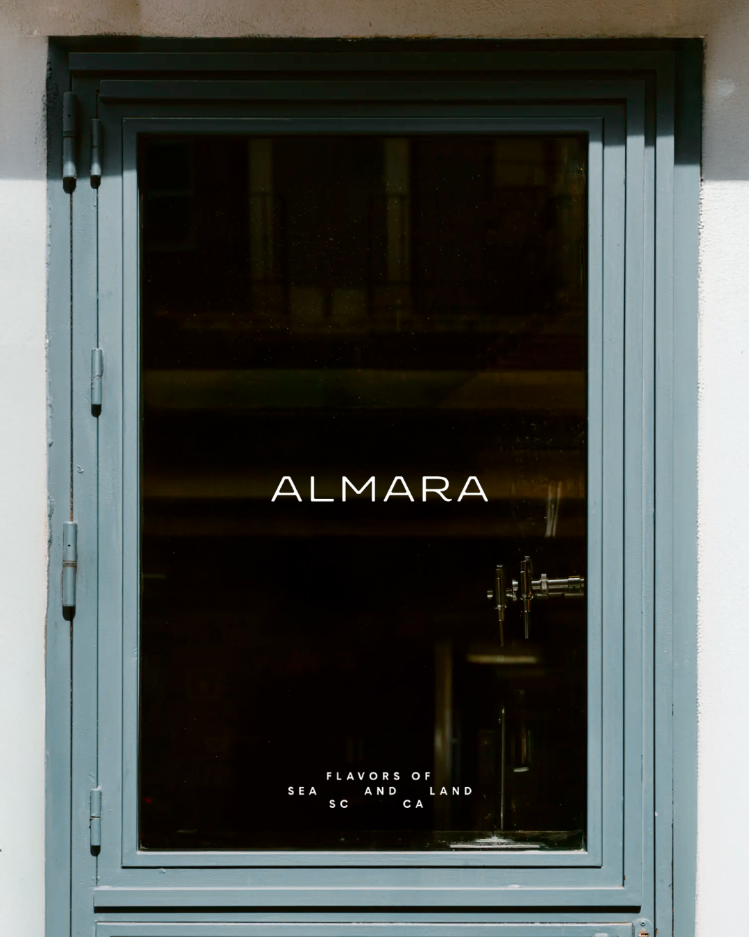 Almara hospitality brand identity applied on restaurant staff uniform