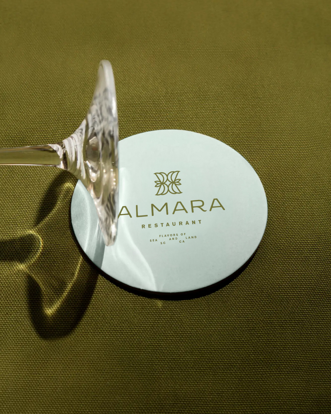 Almara restaurant brand identity applied to coaster design