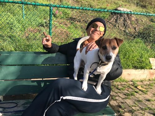 Woman holding Jack Russell Terrier