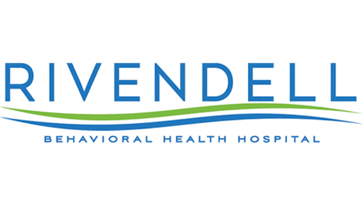 A woman smiles at a person in a diabetes support group