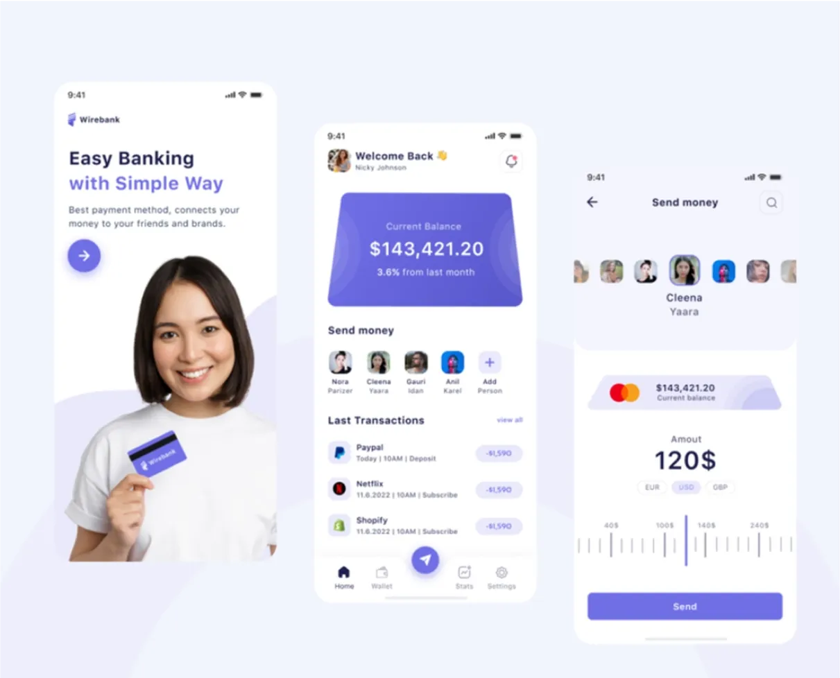 A woman holding a credit card in her hand.