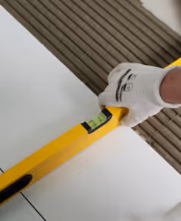 Person installing flooring