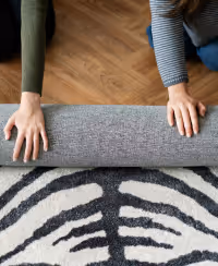 Person installing flooring