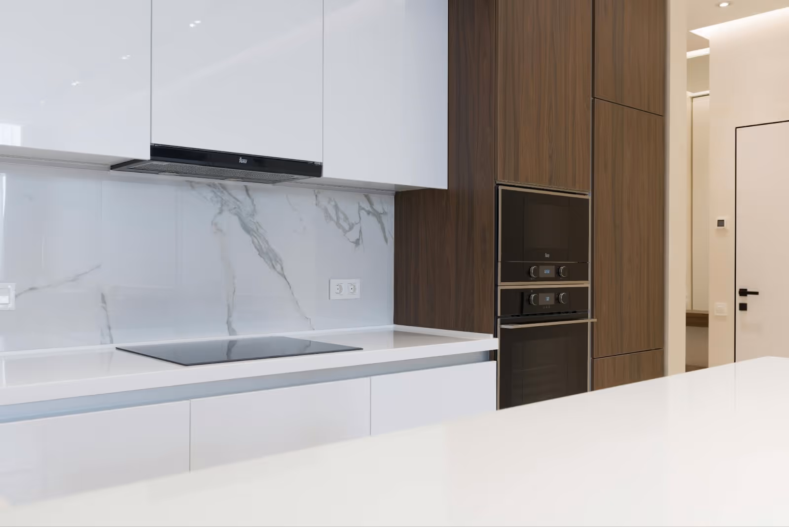 Kitchen with marble backsplash