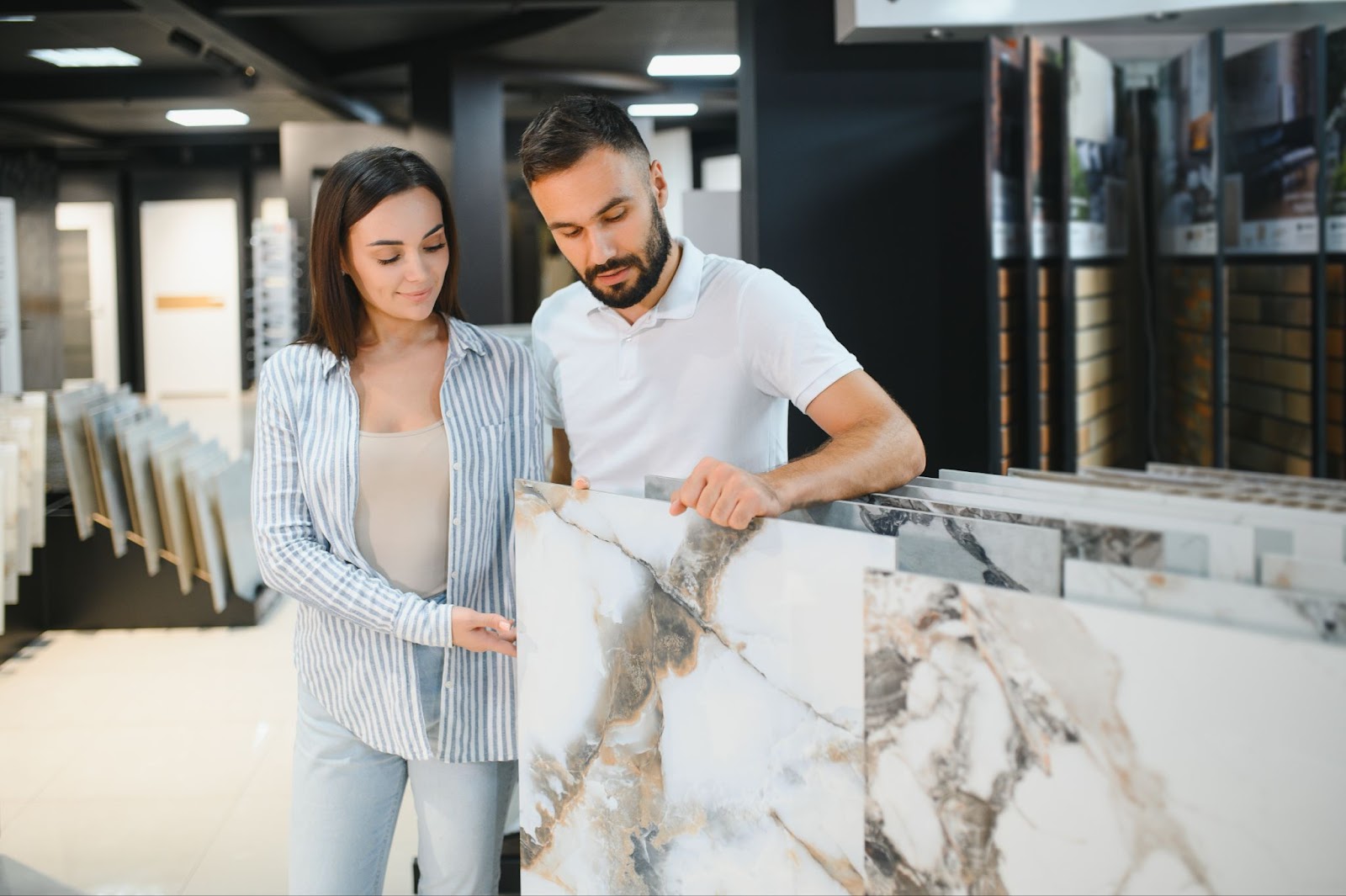 Couple choosing bathroom tiles