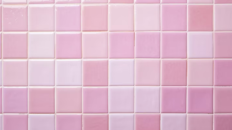 Mosaic shower tiles in various shades of pink
