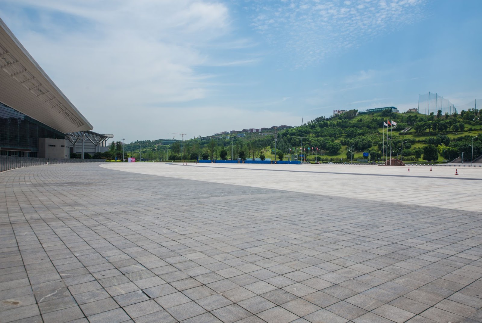Concrete paving with greenbelt view
