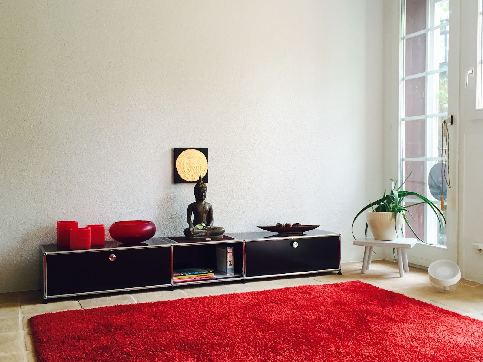 Red rug with warm-toned room