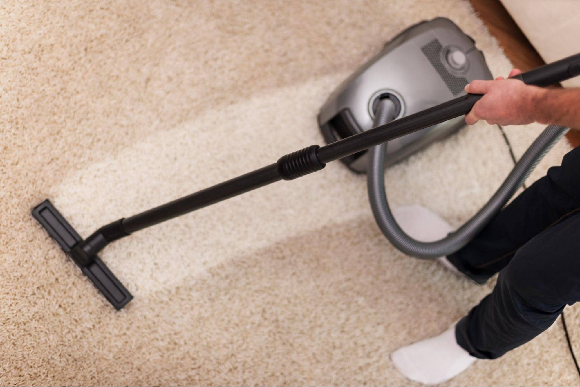 Using a vaccum on carpet