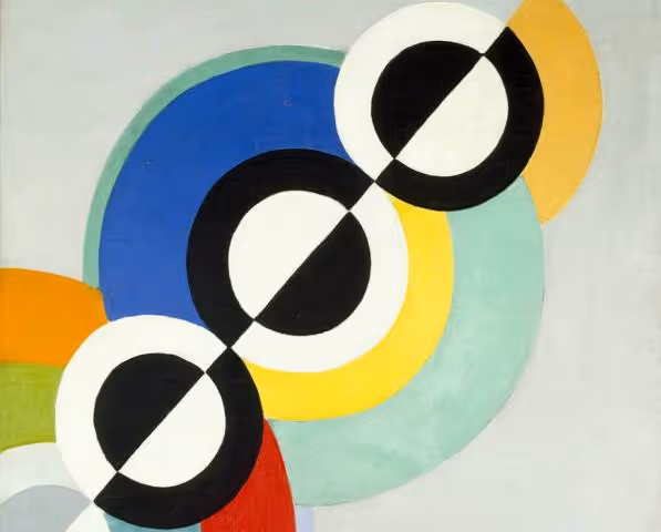 Abstract composition with black circles, yellow forms and blocks of colour.