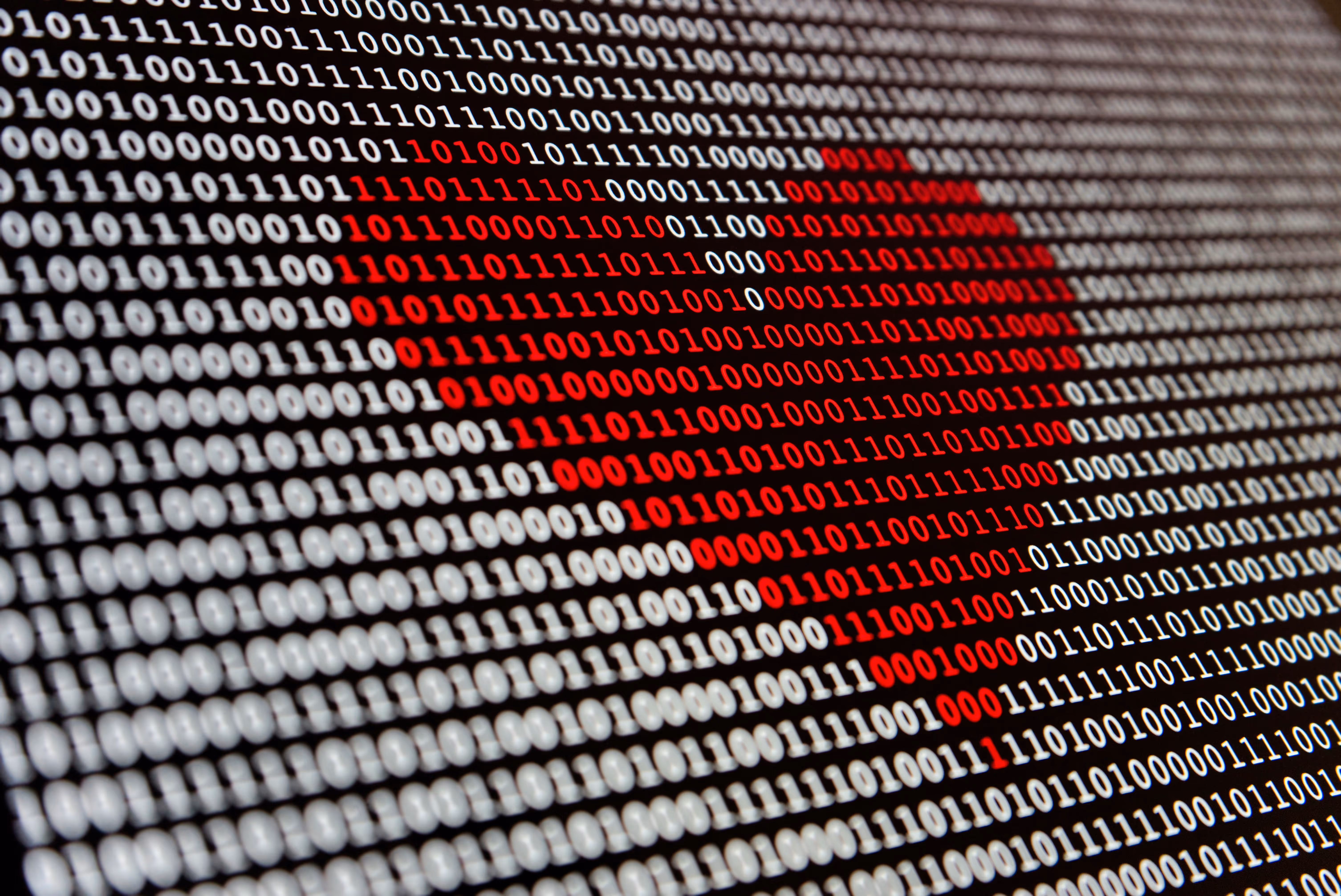 Abstract red-and-white binary data illustration.