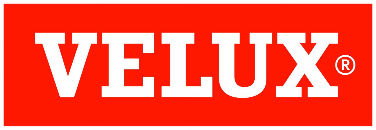 Velux logo i hvit tekst på rød bakgrunn.